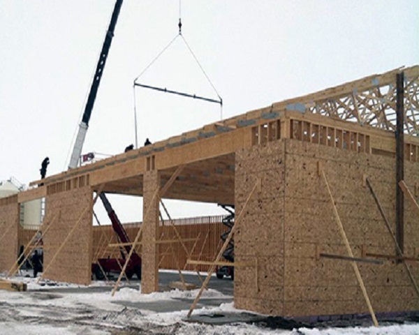 Commercial Construction Site Featuring Framed Building Progress