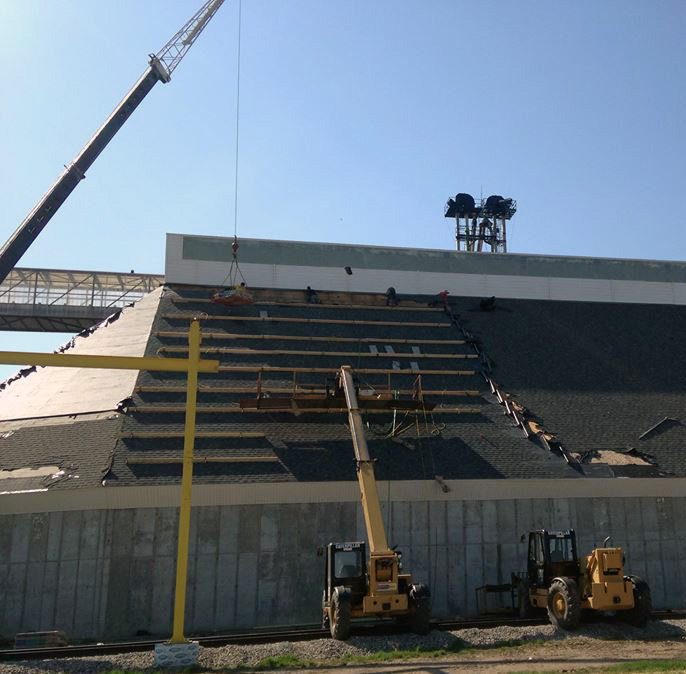 Large-scale commercial construction project with advanced roofing installation