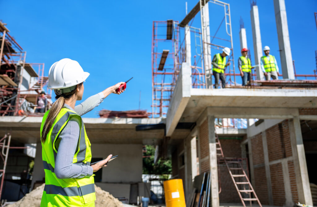 Professional Contractors Working On Large-Scale Construction Site