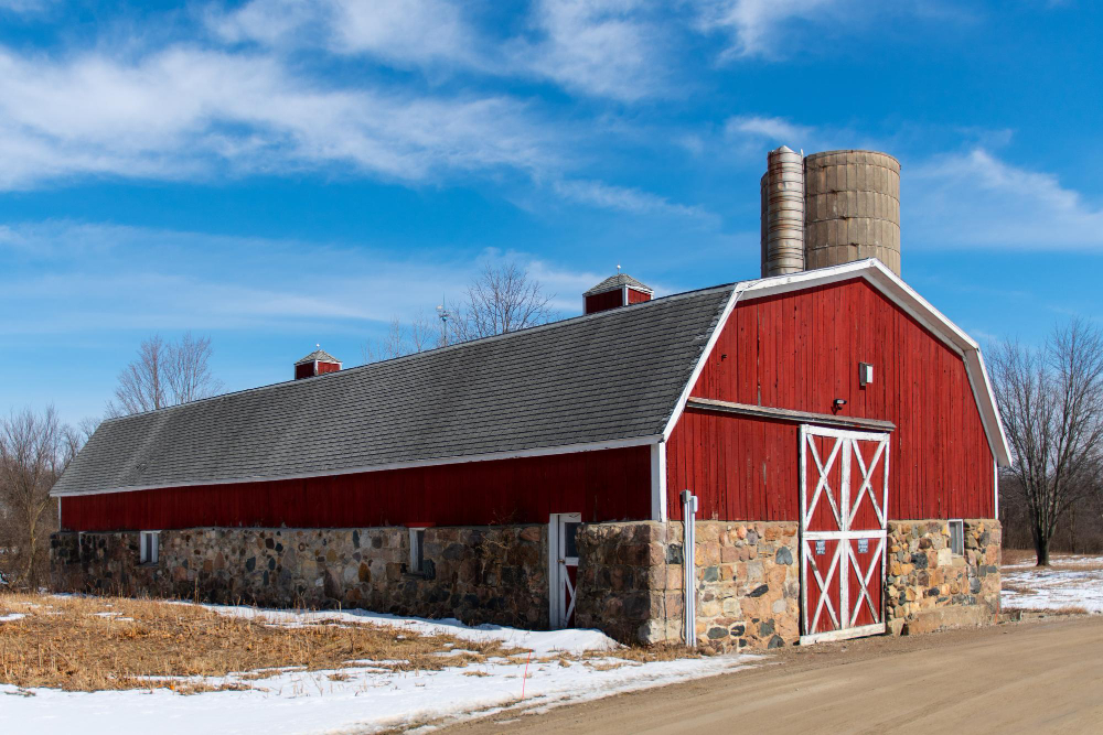 Pole Barn Construction Featuring Stone and Wood