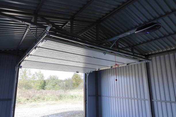 Bi-fold hangar door installed with automated lift system