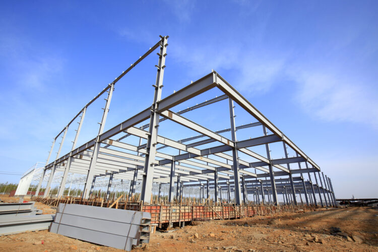 Steel Building Framework Installation In Progress On Site